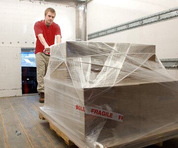 Worker loading cargo